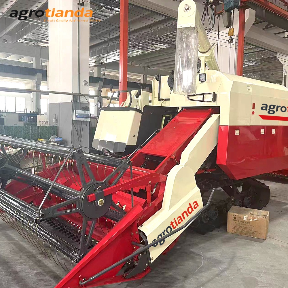Rubber track combine harvester for paddy field